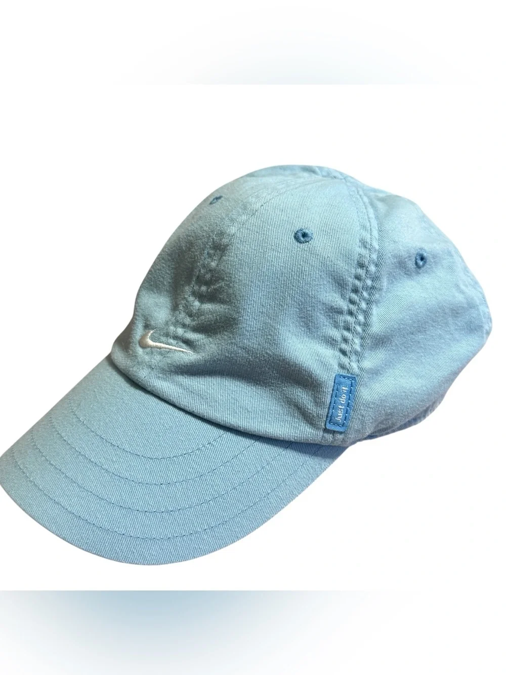 Nike Light Blue a cap With Embroidered White Swoop